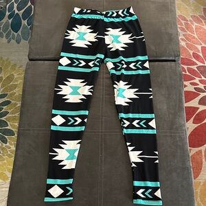 Trendy Black and White Leggings with Turquoise Accents